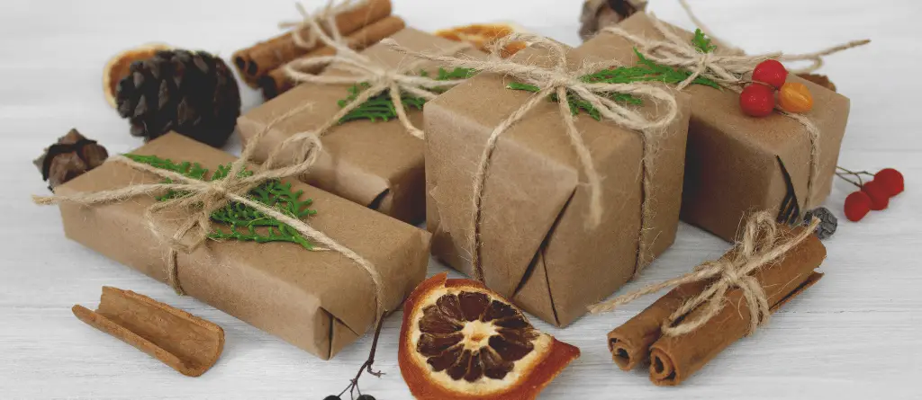 Christmas presents sustainably wrapped in recyclable paper and string.